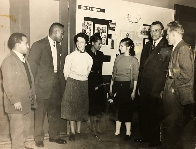 LREI students speaking with foreign exchange students from Ethiopia and France, ca 1955